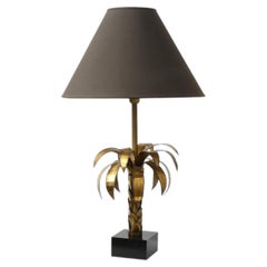Hollywood Regency brass palm tree table lamp with black shade, France, 1970s