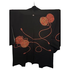 Japanese black silk haori with red/gold Tsuzumi (traditional drum) pattern