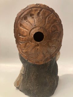 Japanese Shigaraki Pottery Tanuki Figurine with Sake Bottle and Straw Hat