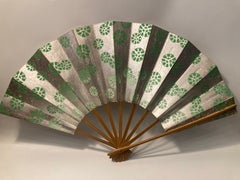 Vintage Japanese Folding Fan with Green Floral Motifs on Silver-Toned Ground