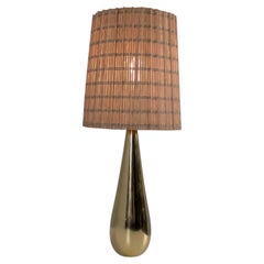 Splendida lampada da tavolo "a goccia" in ottone fuso di Mauri Almari Modello 61046 Idman, anni '50
