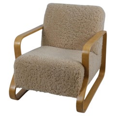 Chaise longue Paimio 44 rembourrée en bouleau et peau de mouton, Artek, années 1950