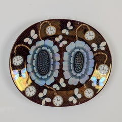 Piatto decorativo Birger Kaipiainen "Duetto" in perline nere e oro, Arabia anni '80