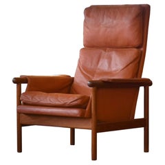 Illum Wikkelsø Highback Leather & Teak Chair