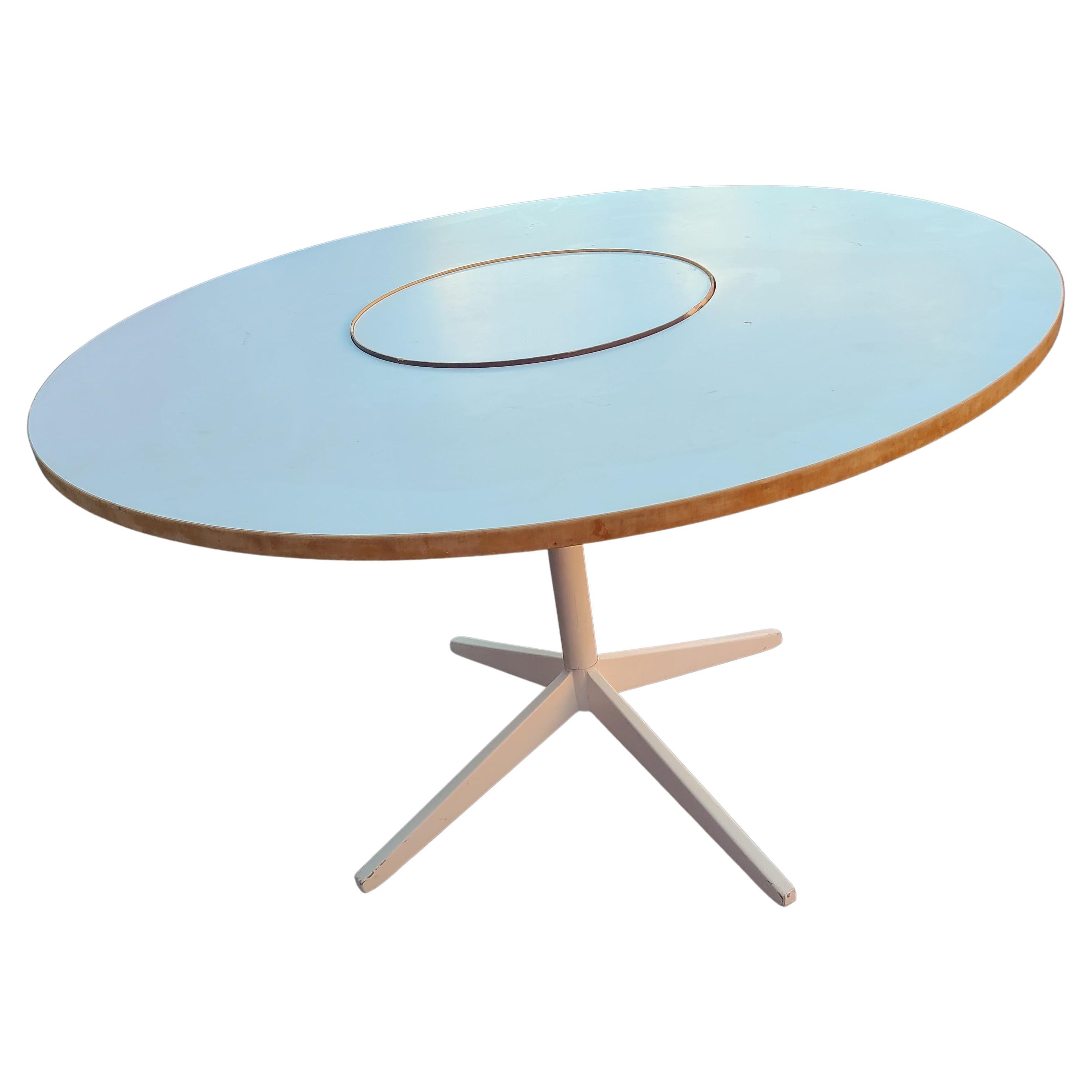 Please message us for a cost effective shipping quote to your location.

Pedestal dining table with rotating Lazy Susan center disc.
Designed by George Nelson for Herman Miller.
  