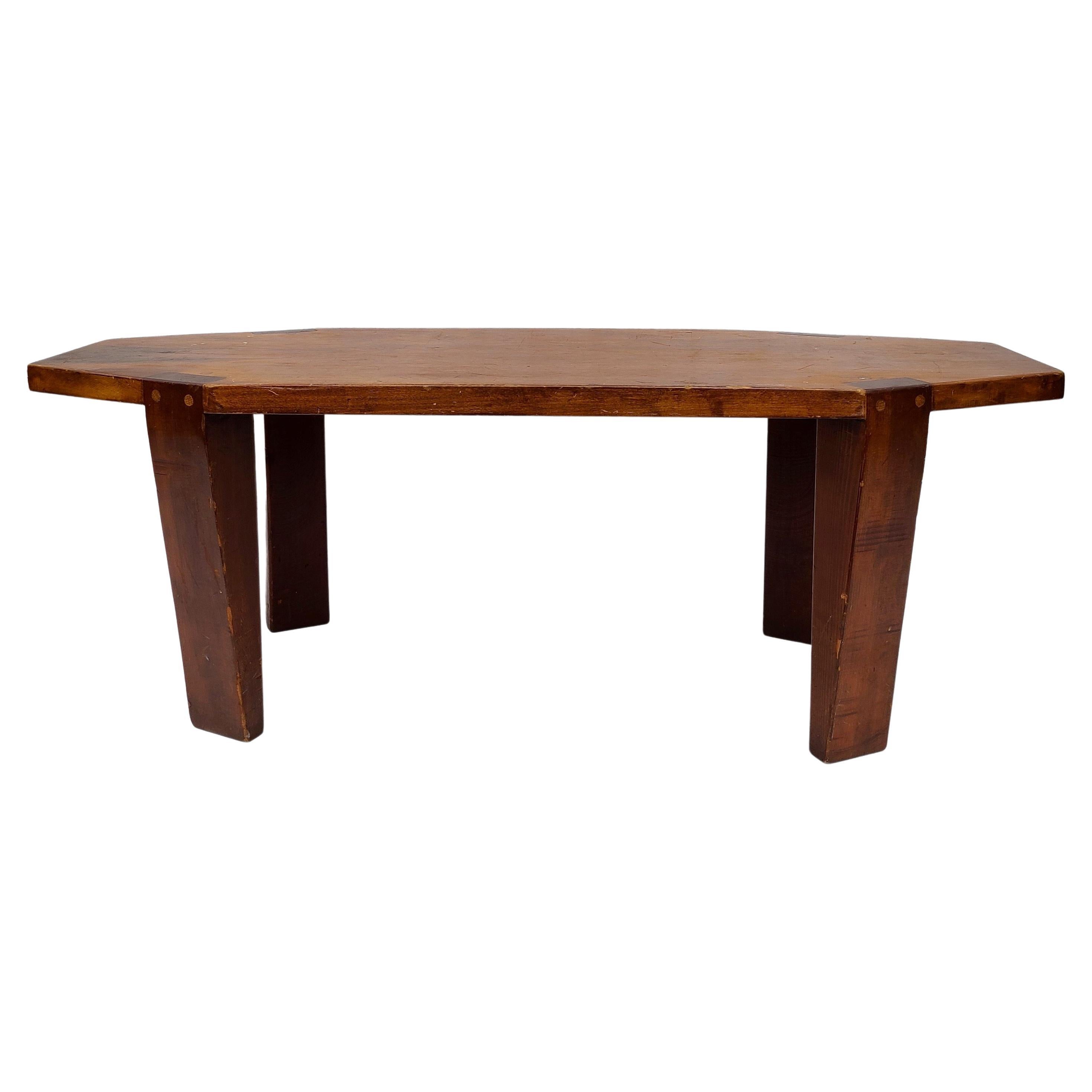 Please message us for a cost effective shipping quote to your location.

Studiocraft coffee table. Appears to be maple top with fir legs. Geometric design fuses interesting angels with simple proportions reminiscent of Charlotte Perriand. Made be an