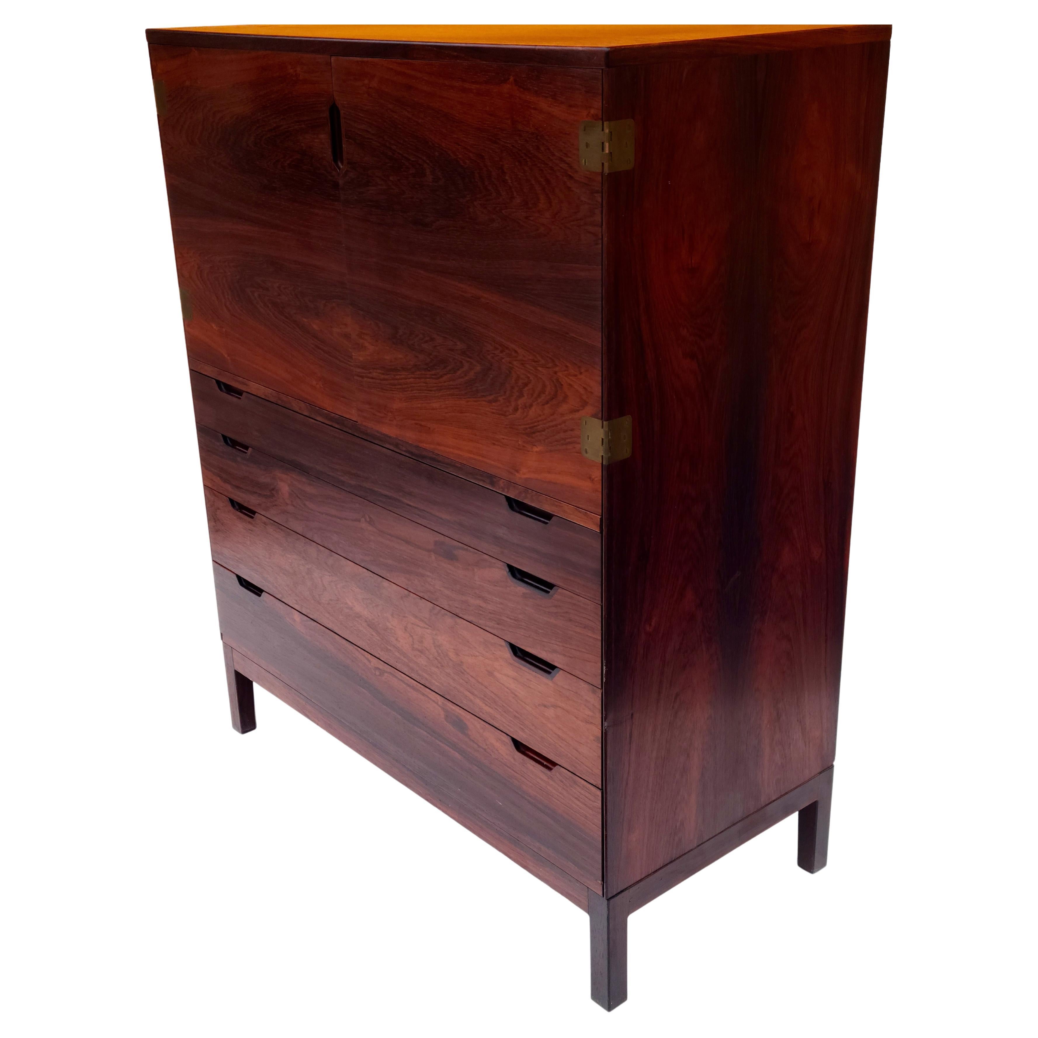 Please feel free to reach out for accurate shipping quote to your location.

Rosewood Gentleman's chest designed by Svend Langkilde.
Made in Denmark by Langkilde Mobler.