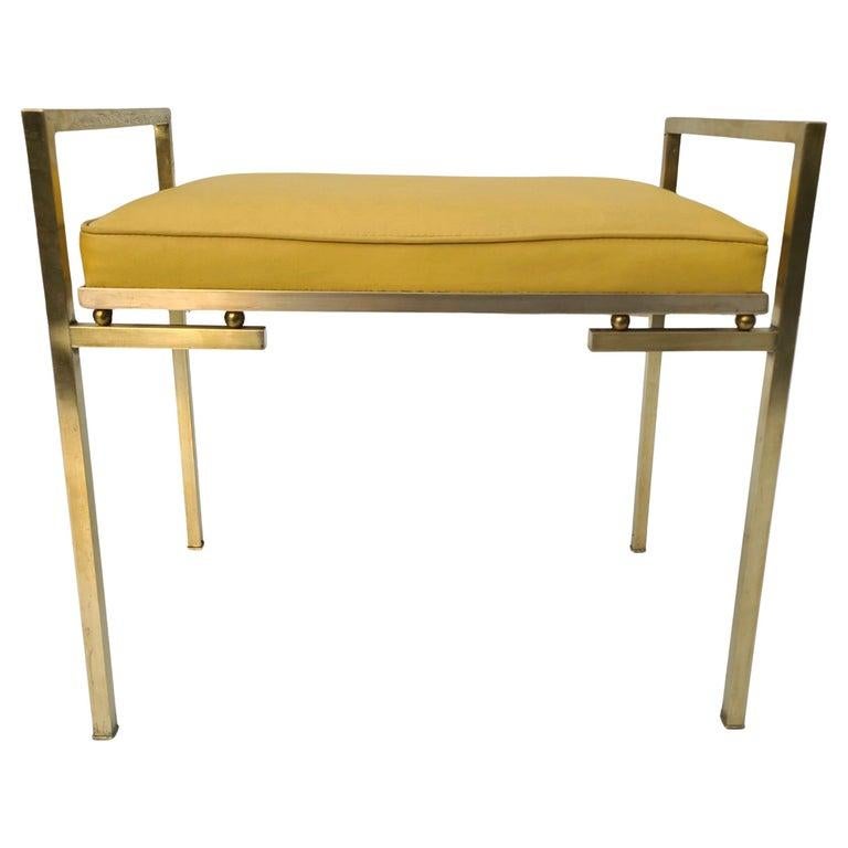 Please feel free to reach out for efficient shipping quote to your location.

Mid Century Modern Brass Bench with Naugahyde seat.
