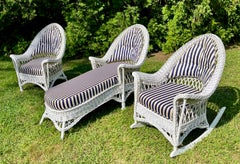 A Three Piece Matching White Bar Harbor Style Wicker Chaise, Rocker and Chair