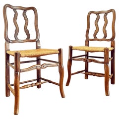 Set of Fourteen Early Twentieth Century French Vernacular Dining Chairs
