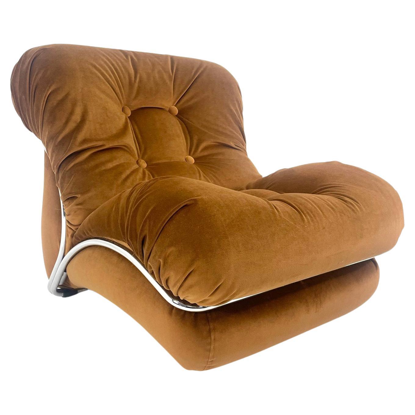 I.P.E., lounge chair, model 'Corolla', velvet, chrome-plated steel, Italy, 1970s

A striking design that will add a vibrant softness to your room.  Lower yourself into a cloud of comfort.  A wing-like structure that resembles a butterfly is used for