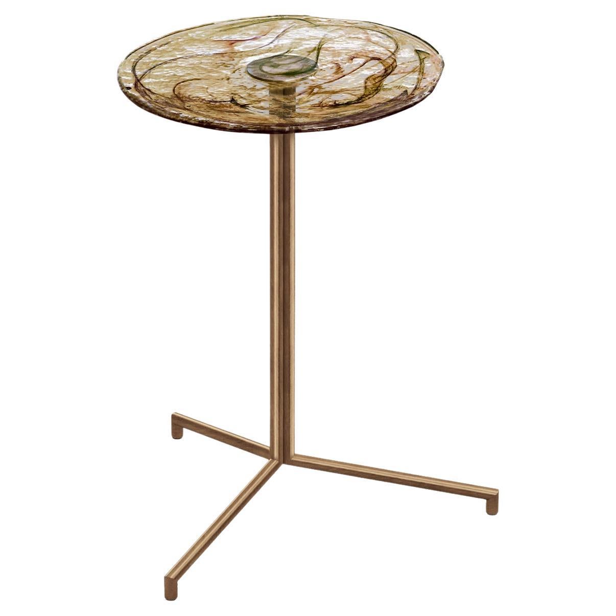 Flat Glass is the prefect unity of artisanal hand work and machine work. Glass part is produced by sculptor Tina Varon. Due to artisanal hand work of glass, each flat side table is one-of-a-kind. There may be slight differences in the dimensions due