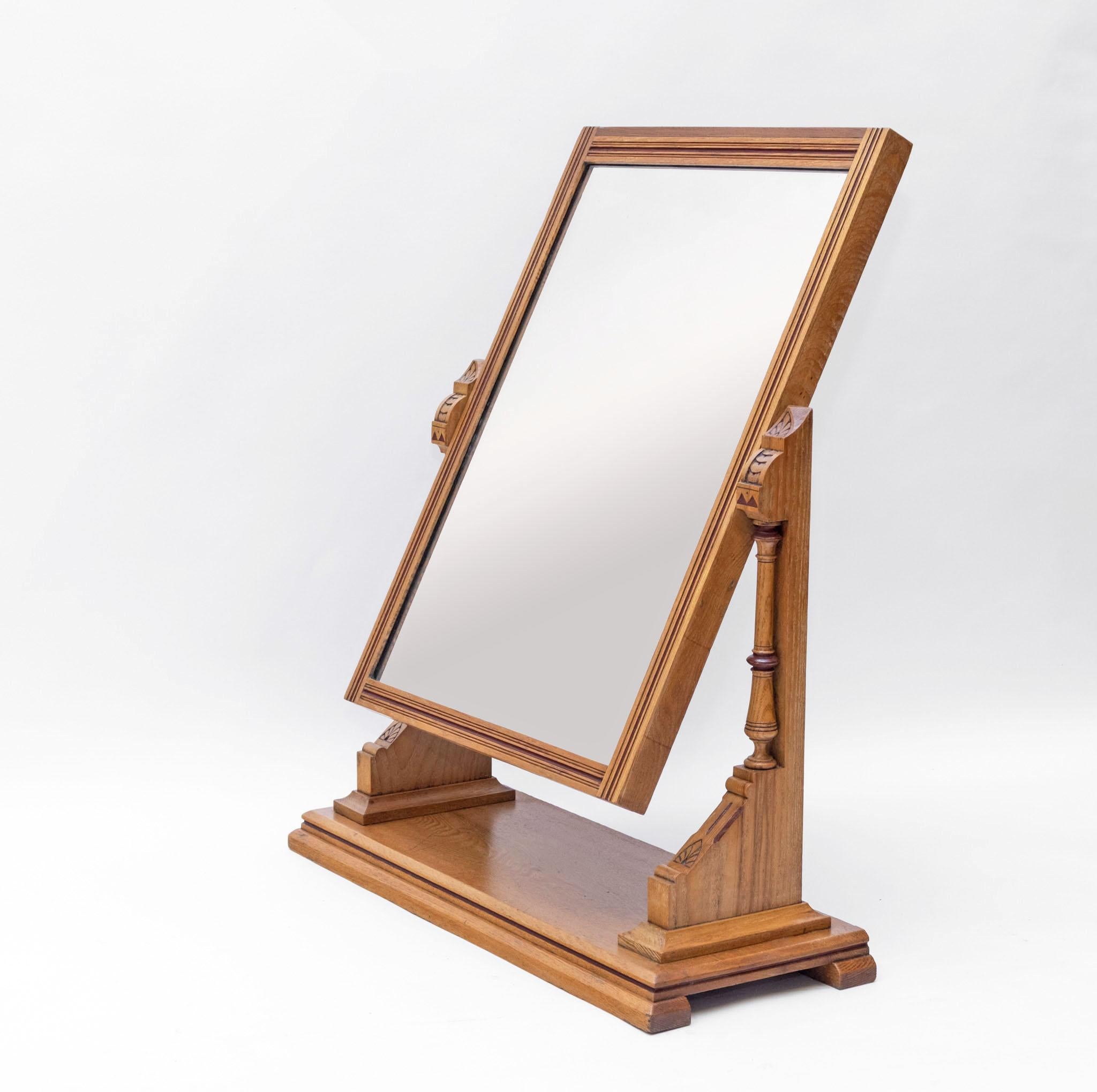 Late 19th century Gothic Revival ash & painted dressing table vanity mirror. English. Circa 1880.

The mirror is supported by angled uprights with central turned column, and has painted detail around the frame. The mirror holds well in situ and can