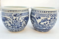 A pair of Chinese blue and white hand painted porcelain jardinières circa 1880
