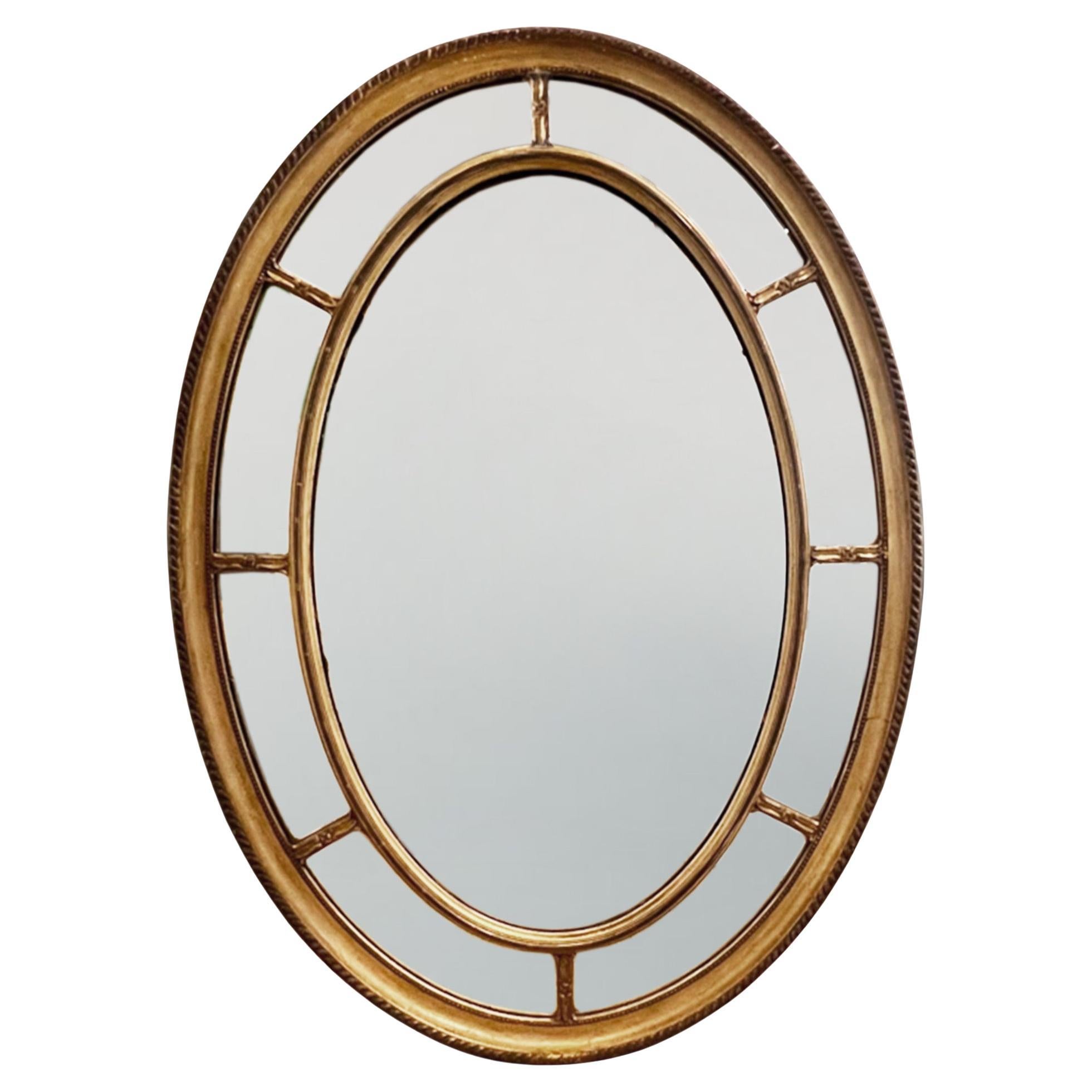 Grande specchio ovale in legno dorato francese della fine del XIX secolo in vendita