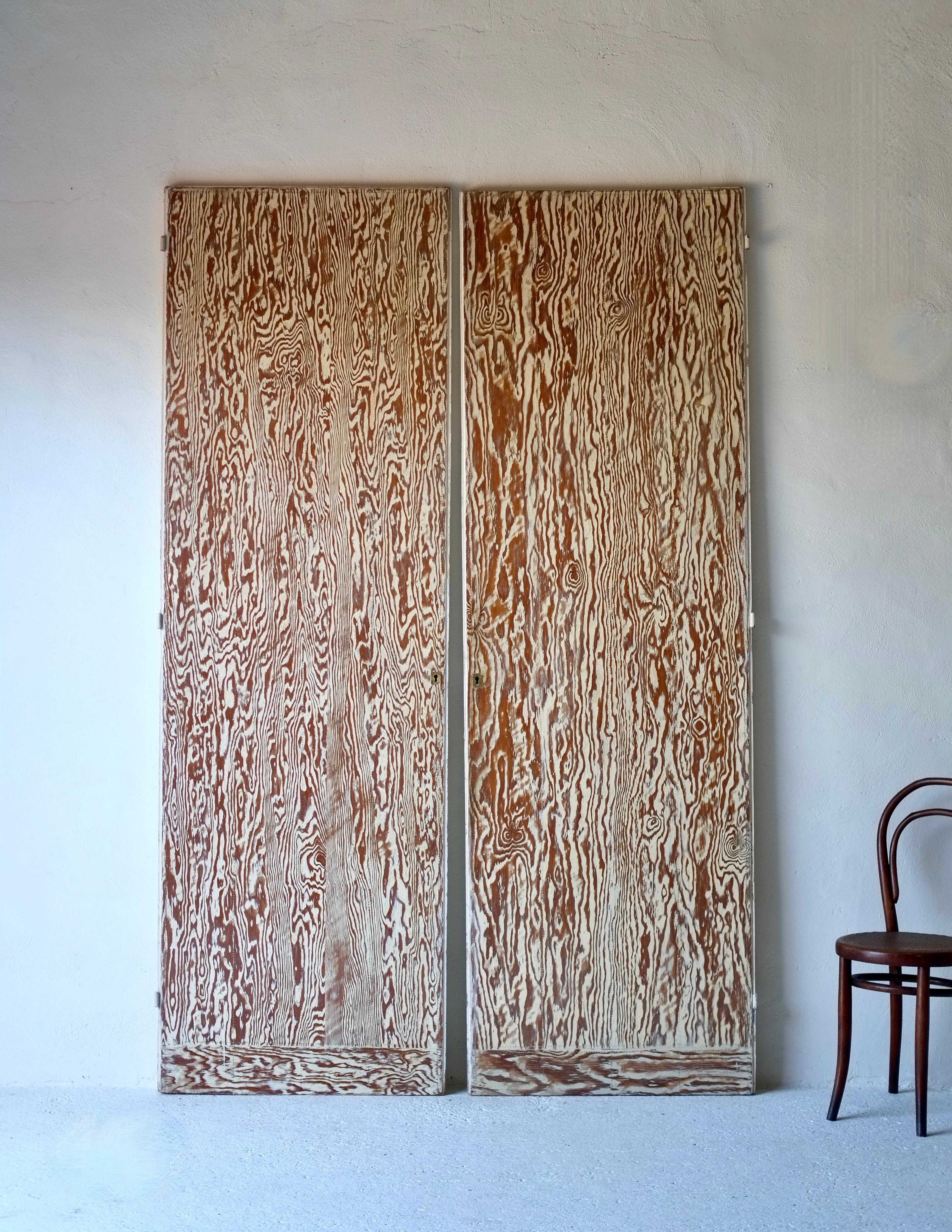 An exceptional pair of large one off doors by pioneering French Art Deco designer André Sornay (1902-2000).

Circa 1930's, Lyon, France.

Hand painted wood featuring Sornay's signature 