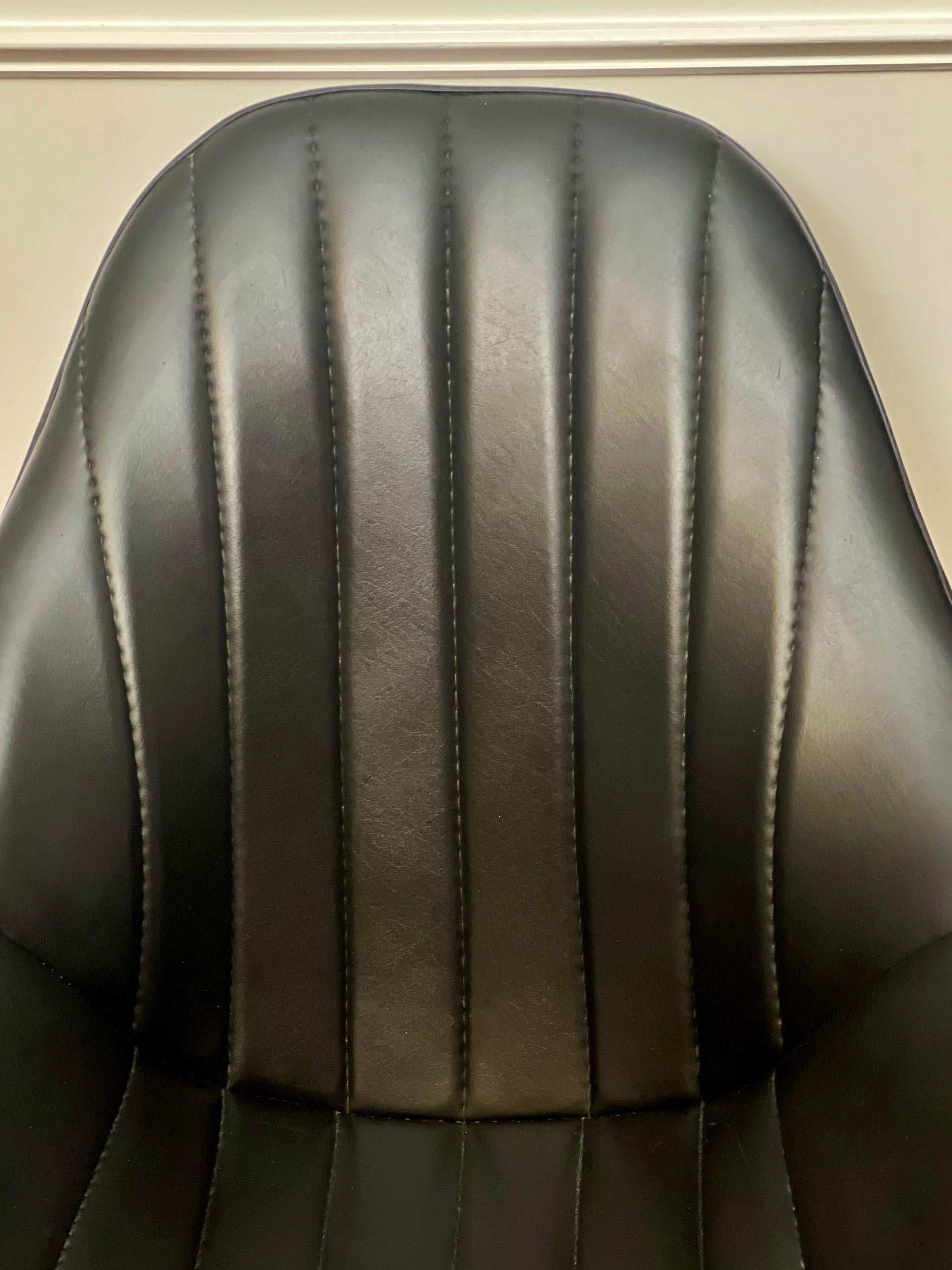 Naugahyde Vintage Modern Black Faux Leather Swivel Bucket Lounge Chair For Sale
