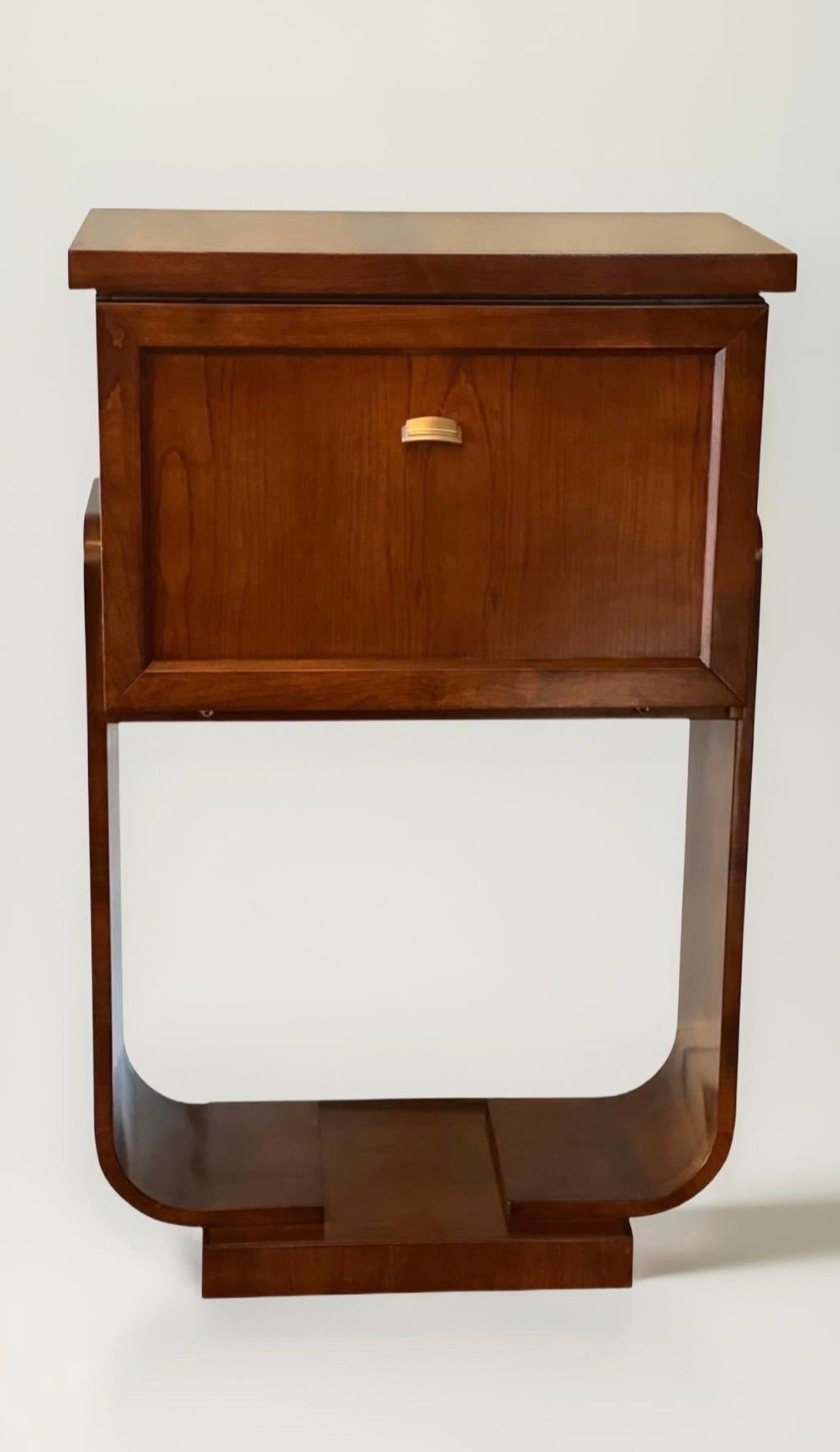 Exquisite Art Deco bar cabinet with drop front door by SELVA, Italy. This is a stunning cabinet expertly handcrafted by one of Italy's premier luxury furniture 
houses, SELVA, founded in 1968. The door gently pulls down to reveal spacious storage