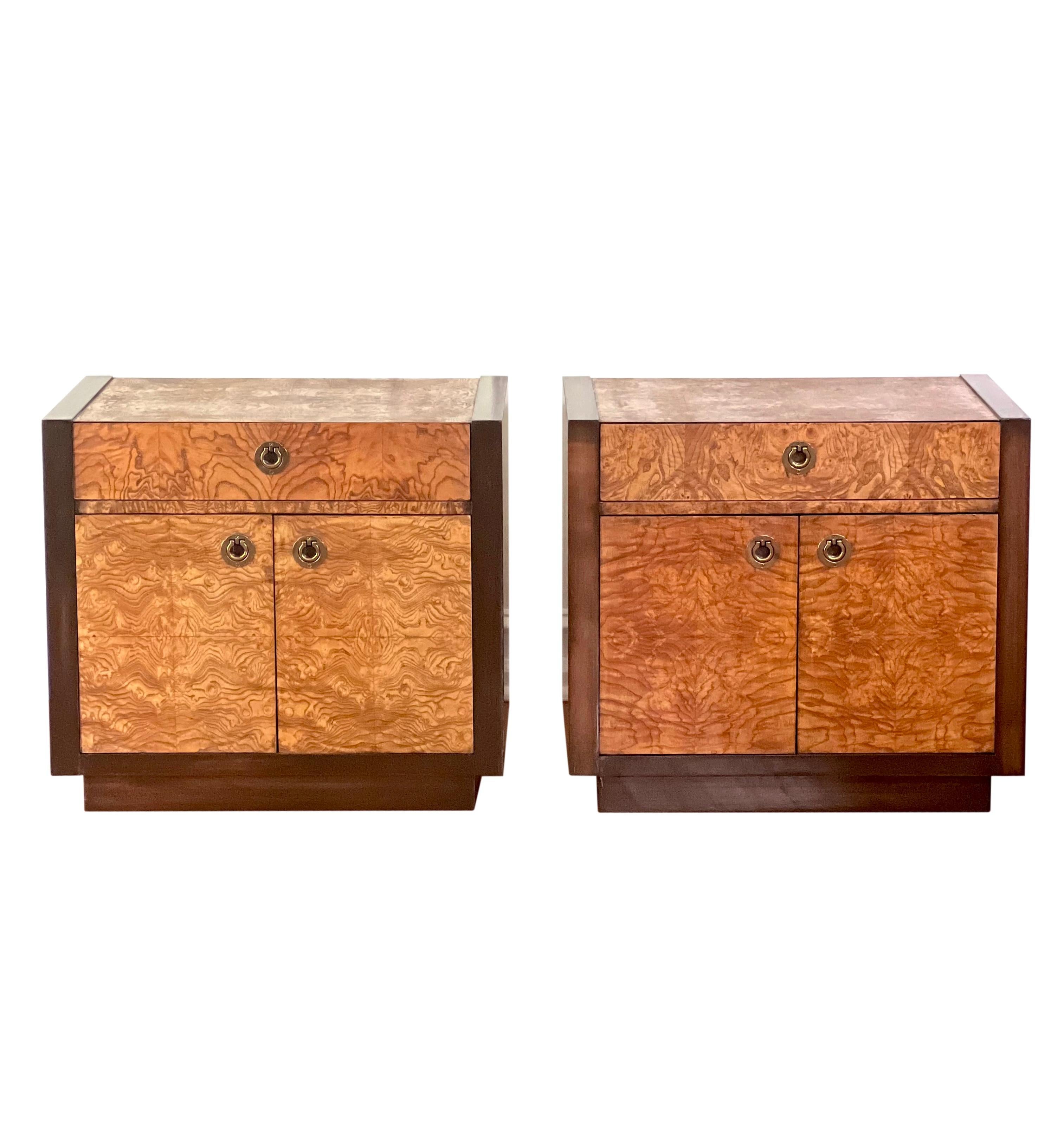 VIntage Milo Baughman style nightstands by Century Furniture.

The stands have rich burl veneer and contrasting dark wood grain which complement one another beautifully. They feature a single dovetail drawer and a spacious cabinet beneath with