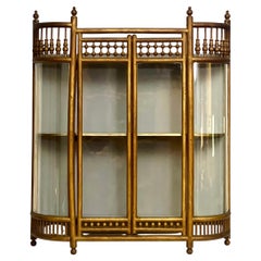 1920s Wall Curio Cabinet with Curved Glass Demilune Stick and Ball Design
