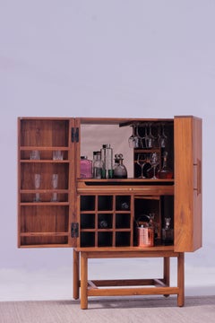 Midcentury Modern solid Oak wood Hide-a-Bar cabinet with pull out tray and brass