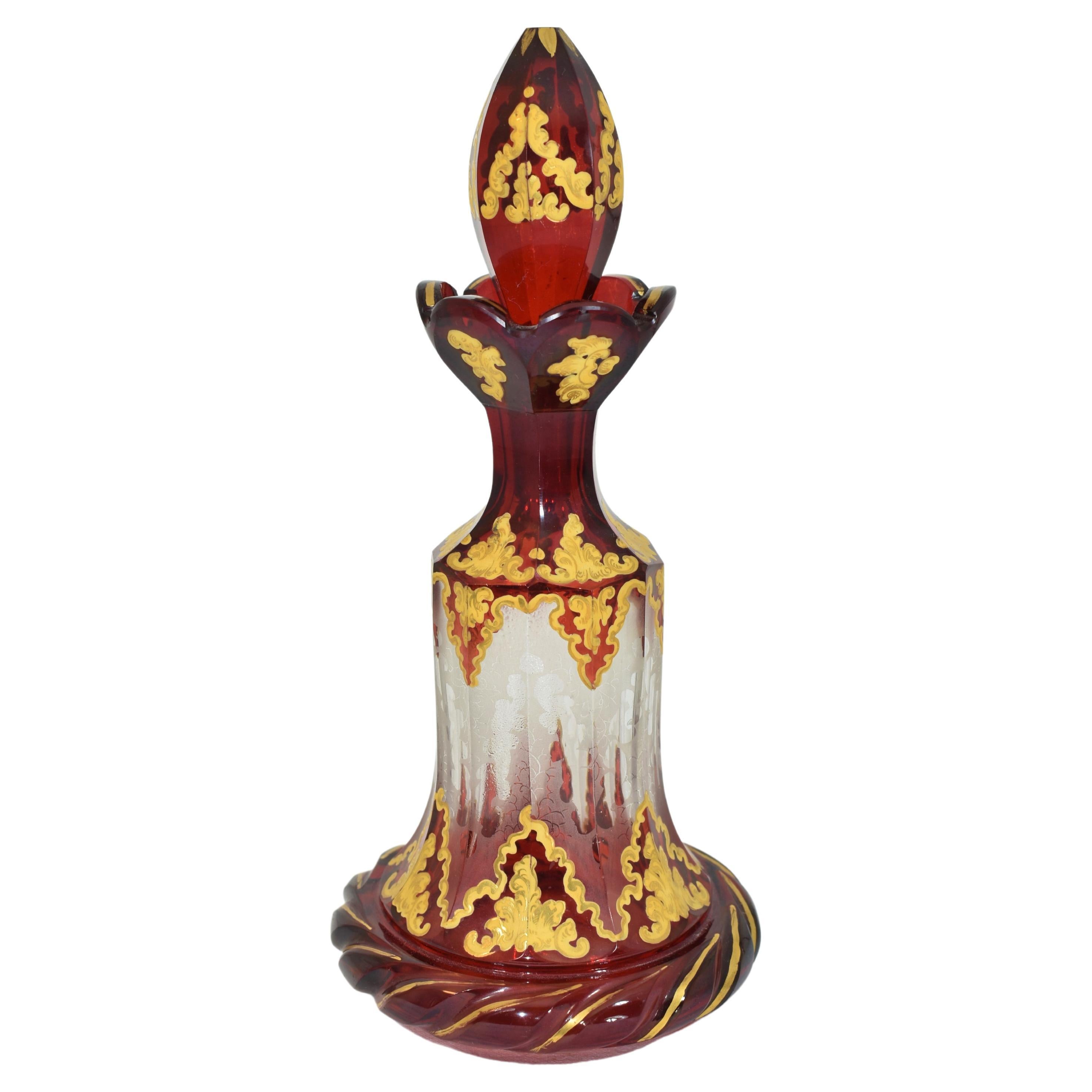 Bohemian crystal, deep ruby cut glass perfume bottle and stopper.
decorated with impressive gilded enamelled decoration.
Bohemia, 19th century.