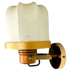 Italian articulated "Cocoon" wall light, resin and pine, 1970's