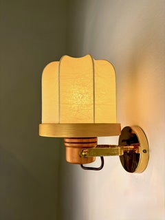 Italian articulated "Cocoon" wall light, resin and pine, 1970's