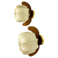 Pair of "Cocoon" wall lights, resin and pine wood, Italy, 1970's