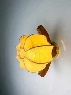 Italian "Cocoon" wall light, resin and pine wood, 1970's