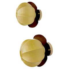Pair of Italian "Cocoon" wall lights, resin and pine wood, 1970