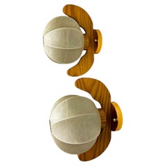 Pair of Italian "Cocoon" wall lights, resin and pine wood, Circa 1970