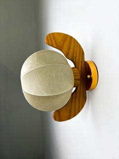 Italian "Cocoon" wall light, resin and pine wood, Circa 1970's