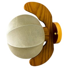 Italian "Cocoon" wall light, resin and pine wood, Circa 1970's