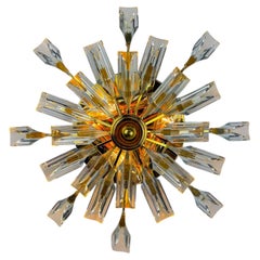 Lámpara de techo o de pared con forma de sol, diseñada por Oscar Torlasco para StilKronen, Italia, década de los 70