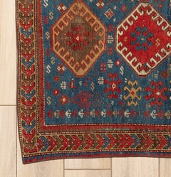 Antique Kazak Rug