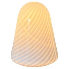 A one of a kind hand blown Murano glass lamp with a swirl pattern, made in Italy