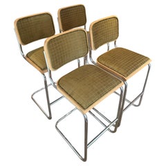 A classic set of 4 Cesca style barstools in the style of Marcel Breuer