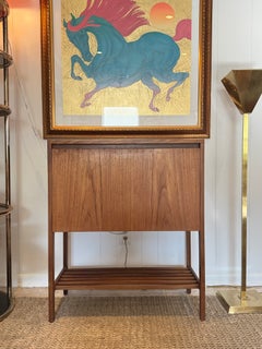 A vintage Danish drop front bar cabinet, circa 1960s. Petite