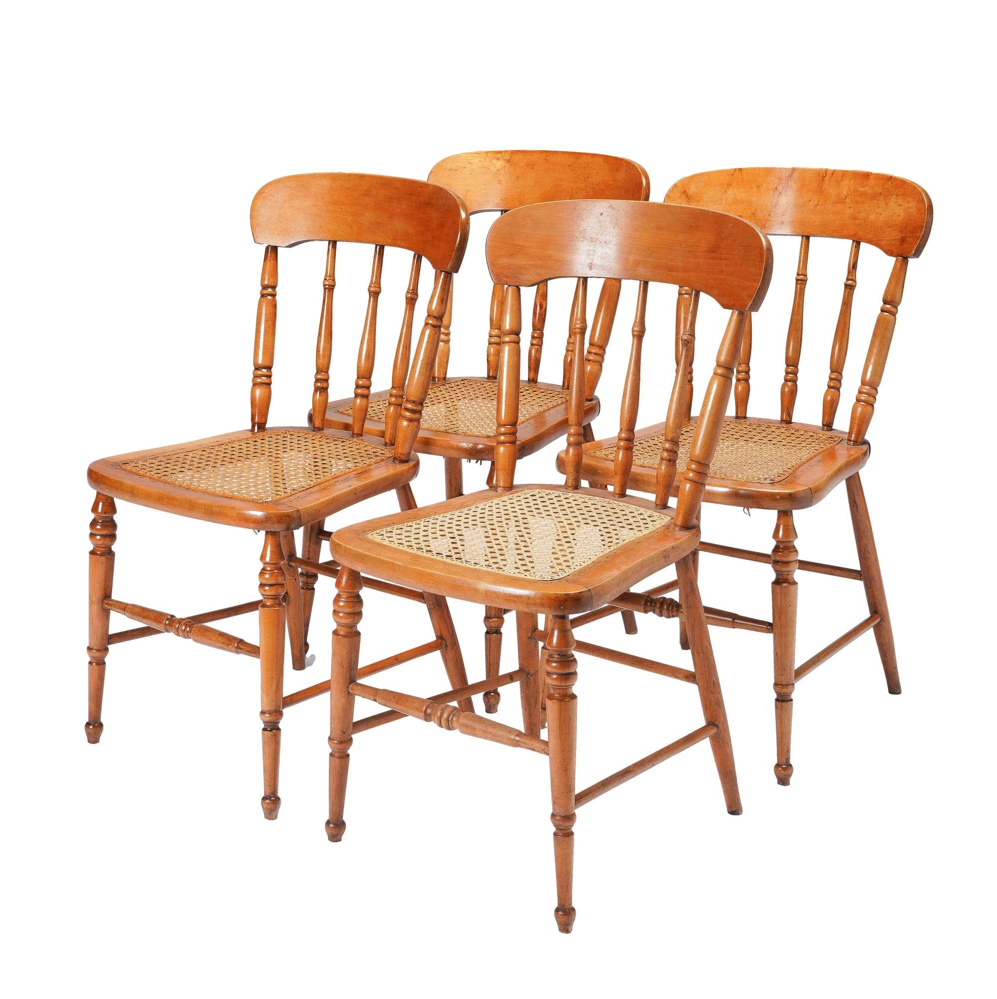 Set of four cane seat country Sheraton maple fancy chairs fitted with custom horse hair filled seat cushions with rope ties.
New England, circa 1840-60.

Dimensions: 16-1/4” W x 20-1/2” D x 32” H
17” (seat height)
15-1/4” (seat depth)