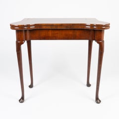 English Queen Anne walnut flip top concertina game table, 1720