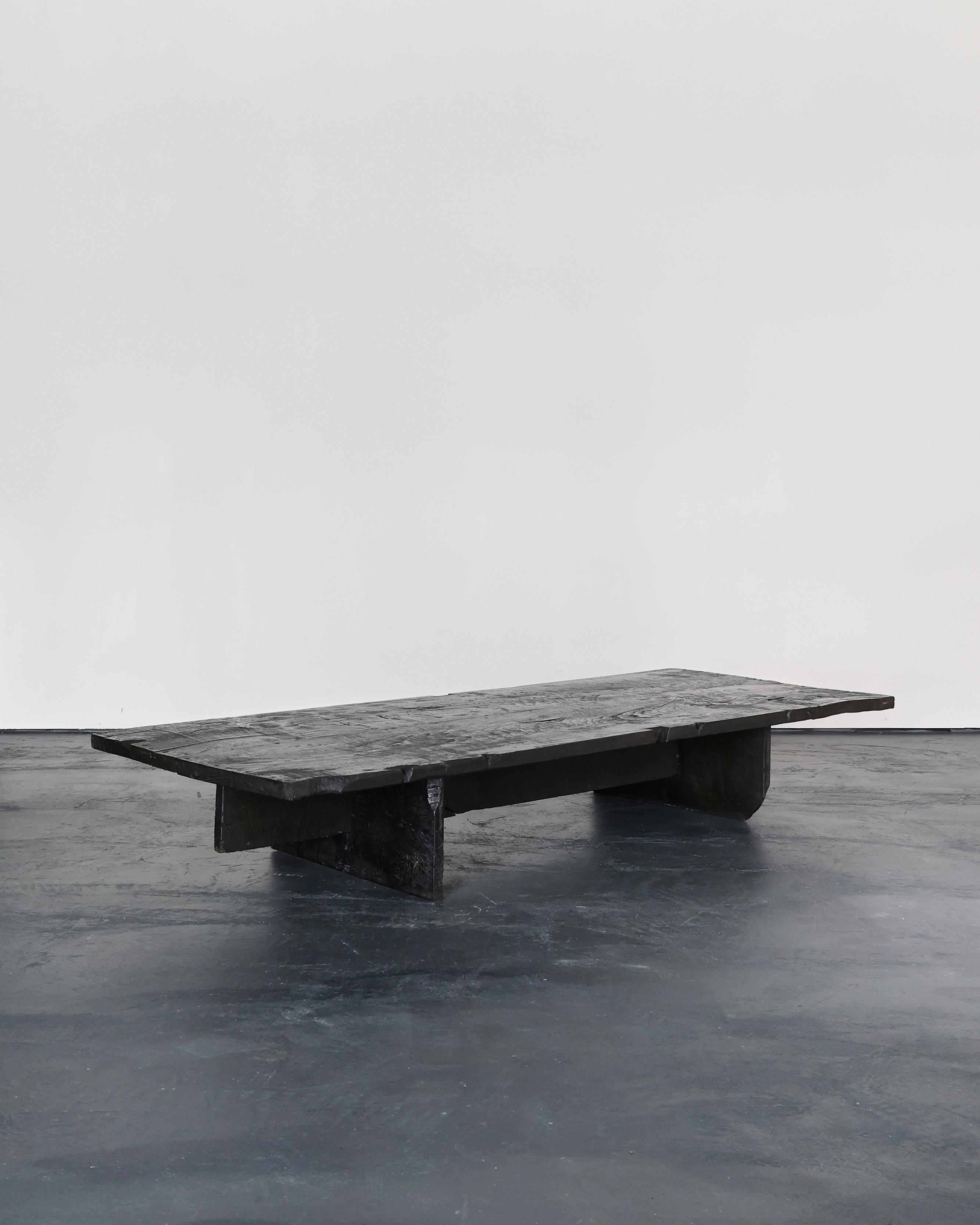 A huge primitive low table/coffee table in heavily patinated 18th C. Portuguese chestnut.

Designed and built by us in our London workshop.