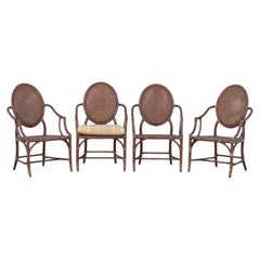 Set of Four Elinor McGuire Rattan Oval Cane Back Dining Arm Chairs