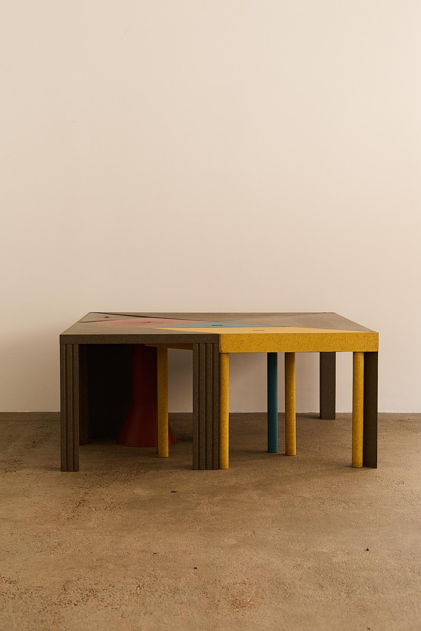 This vibrant set of seven modular tables from the Tangram series, designed by Massimo Morozzi for Cassina in the early 1980s, draws inspiration from the ancient Chinese puzzle game. Playful yet functional, the design invites endless layout