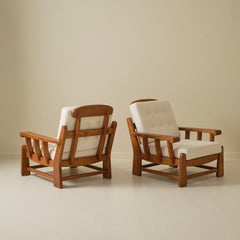 Pair of Maison Regain Brutalist Solid Wood Lounge Chairs, 1970's