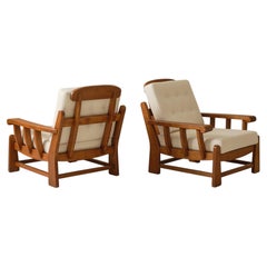 Pair of Maison Regain Brutalist Solid Wood Lounge Chairs, 1970's