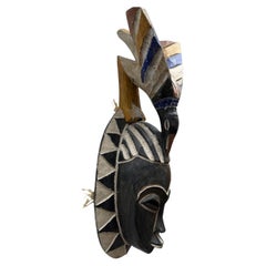African Carved Sculptural Wood Mask with Bird Crest