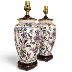 Pair of Ornate Floral Ceramic Urn Table Lamps With Carved Wood Bases