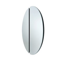 Specchio da parete moderno e minimalista a forma di cerchio diviso con centro nero