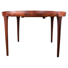Danish extendable dining table in rosewood by Ib Kofod-Larsen for Faarup 1960.